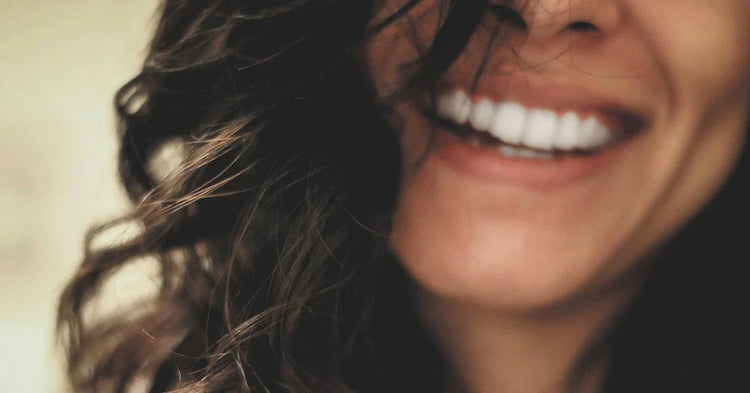 Full range of sustainable oral care products including sonic toothbrush, bamboo brush heads, and eco-friendly travel accessories designed in New Zealand