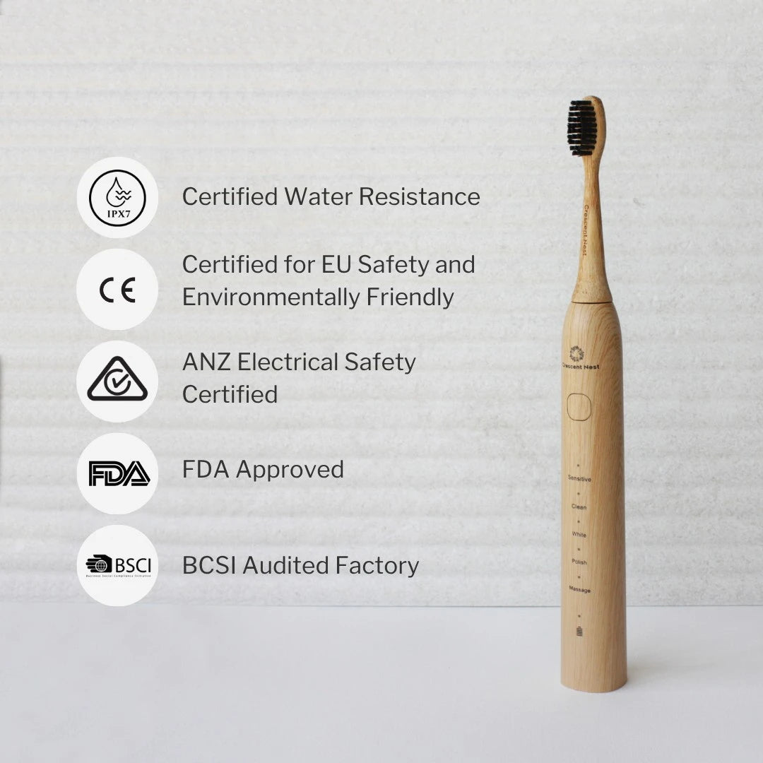 Crescent Nest Sonic Toothbrush standing upright with certifications including FDA, CE, RCM, IPX7 water resistance, and BSCI factory audit