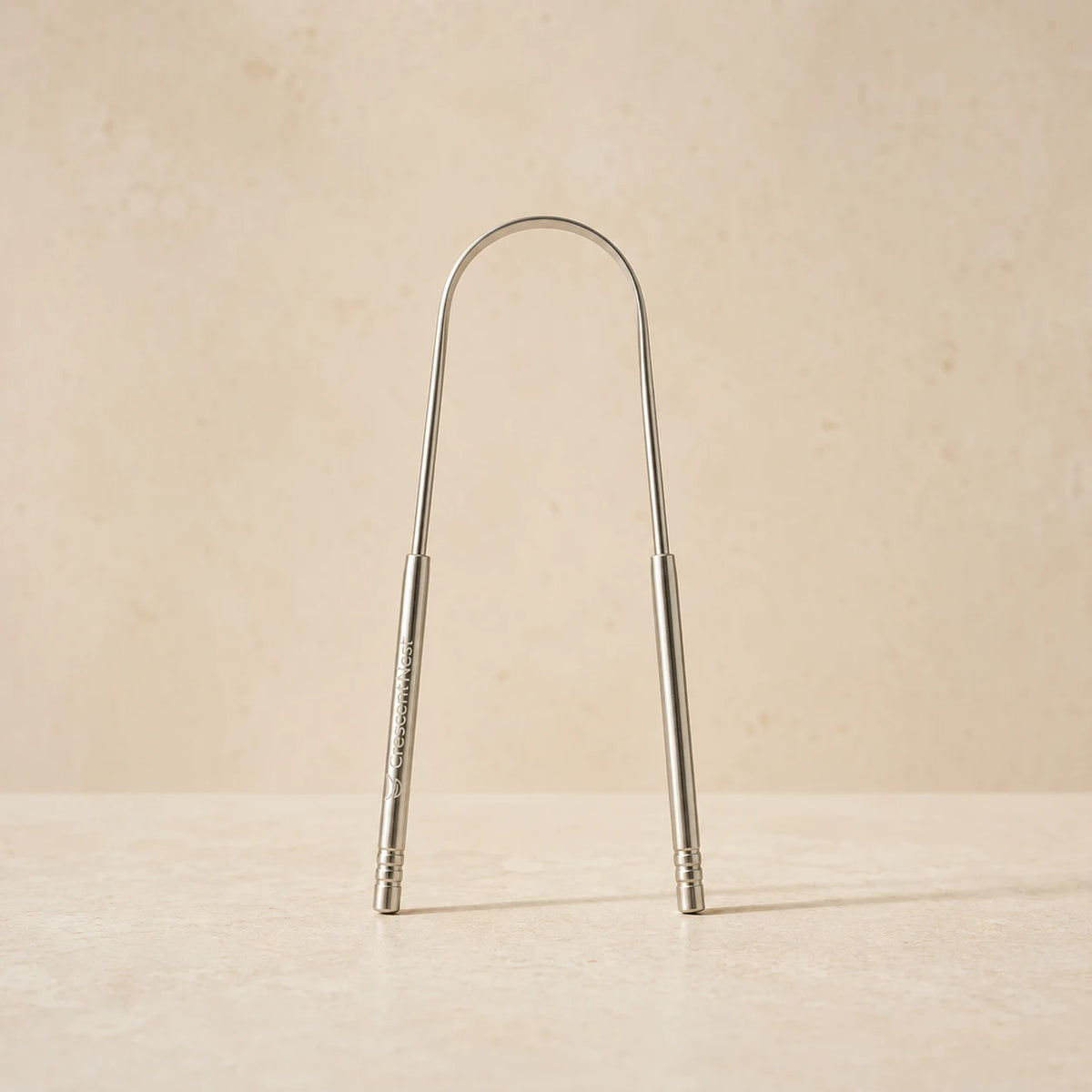 Crescent Nest reusable stainless steel tongue scraper