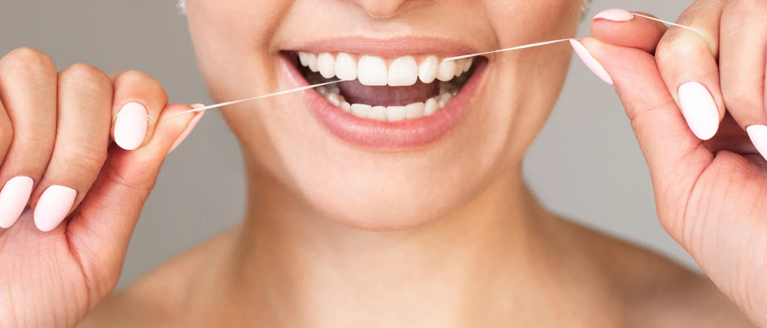 The Healthiest Way to Floss Your Teeth