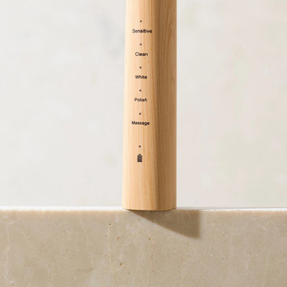 Crescent Nest replacement toothbrush handle on neutral background