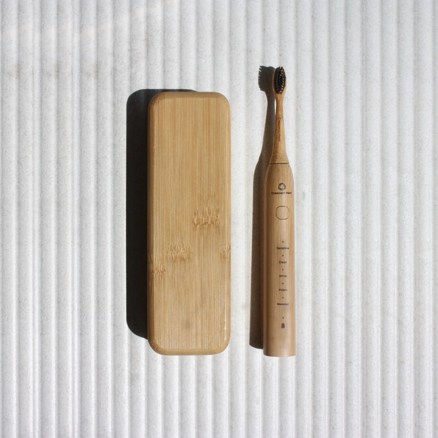Crescent Nest Sustainable Bamboo travel case and sonic toothbrush