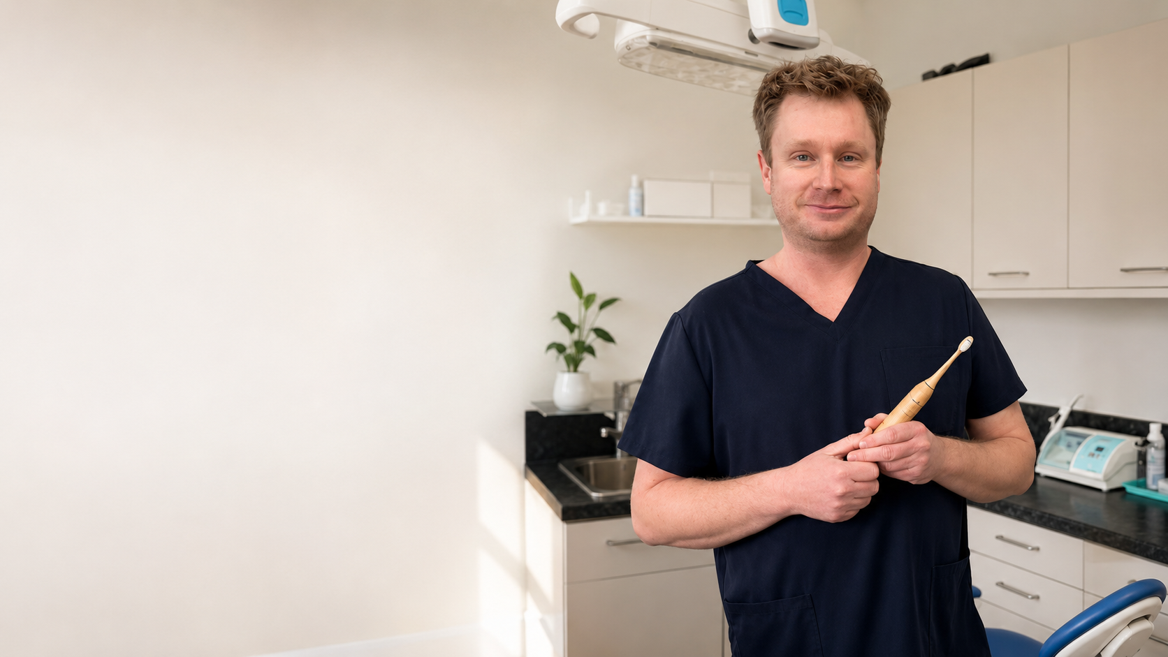 Dr Jason Mandle, General Dentist at Byron Dental Takapuna, with Crescent Nest toothbrush
