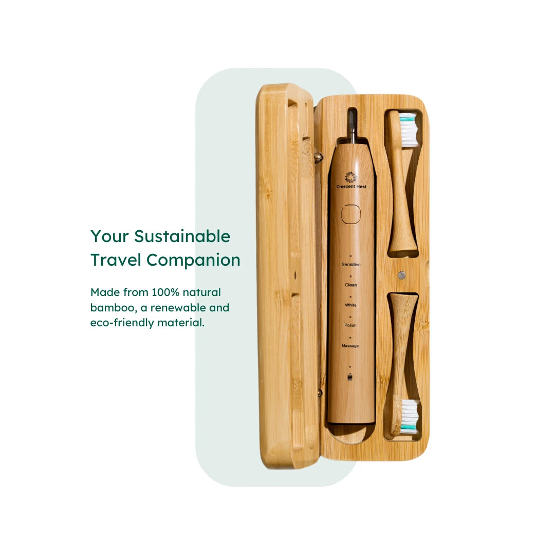 Bamboo toothbrush and electric toothbrush set in a wooden case on a white background.