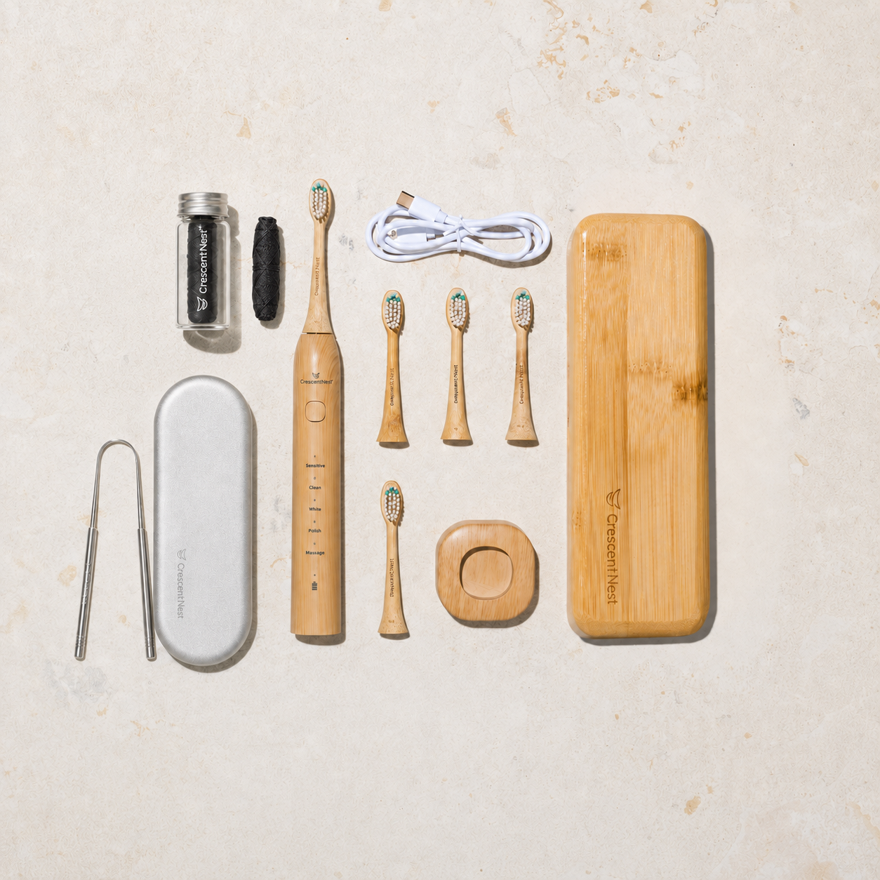Crescent Nest oral care range with sonic toothbrush, tongue scraper, dental floss and refill