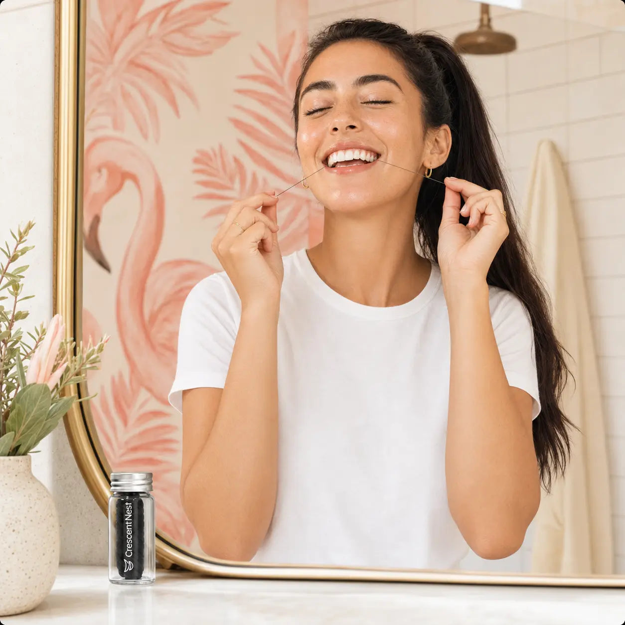 Woman using Crescent Nest bamboo charcoal dental floss in a bathroom mirror