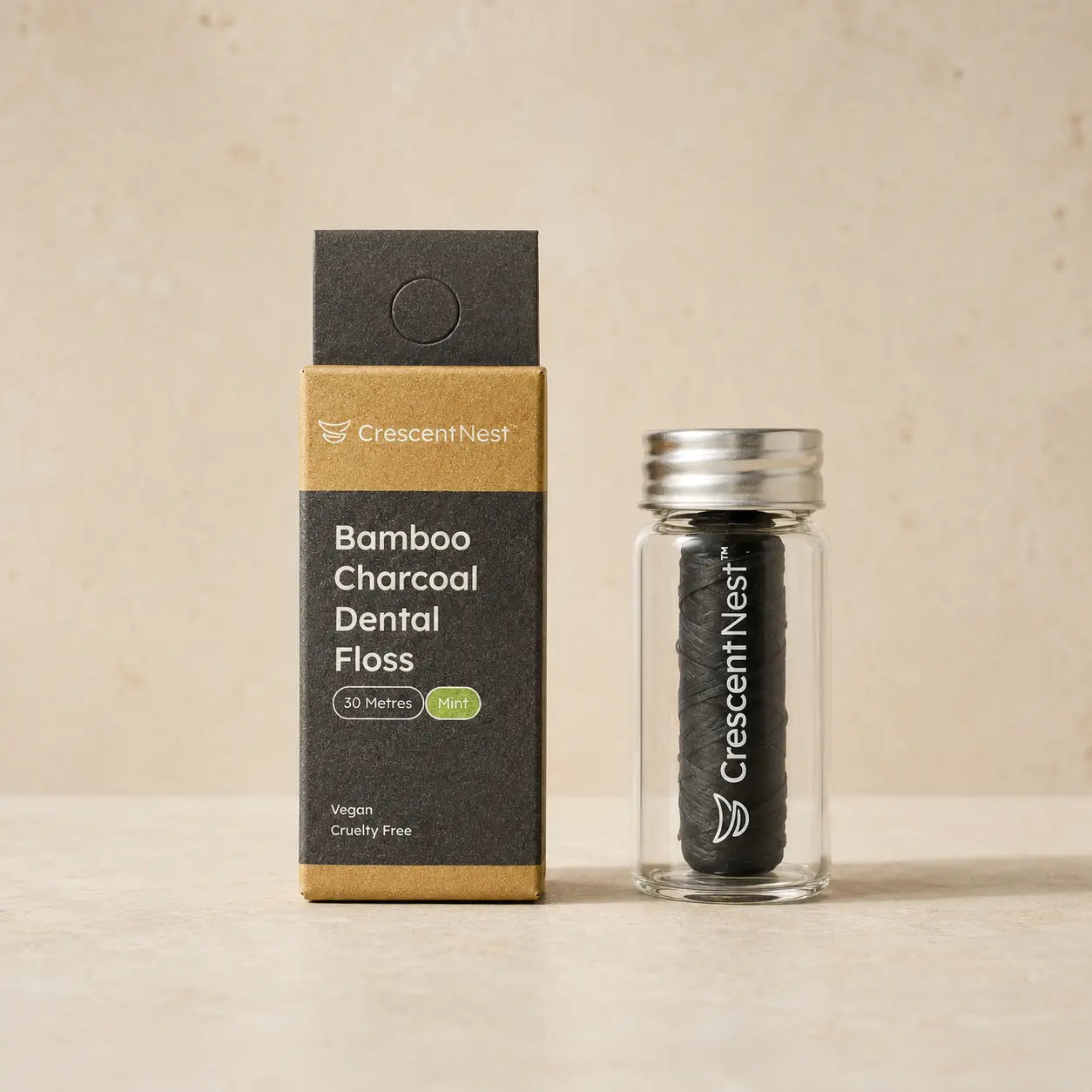 Crescent Nest bamboo charcoal dental floss packaging and reusable glass jar