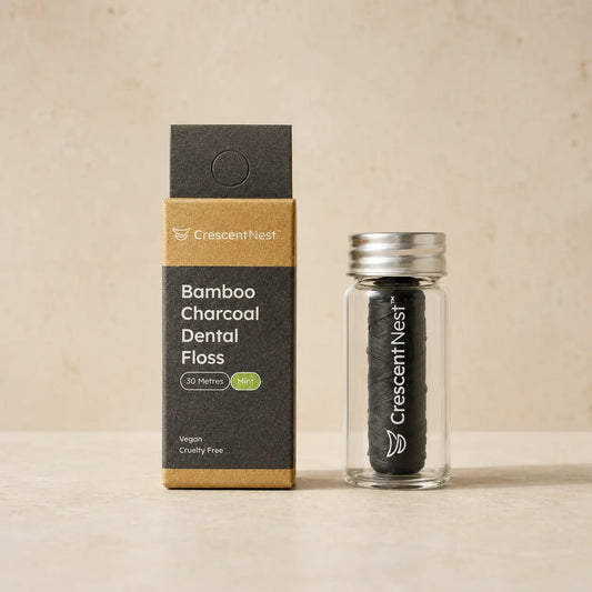 Crescent Nest bamboo charcoal dental floss packaging and reusable glass jar