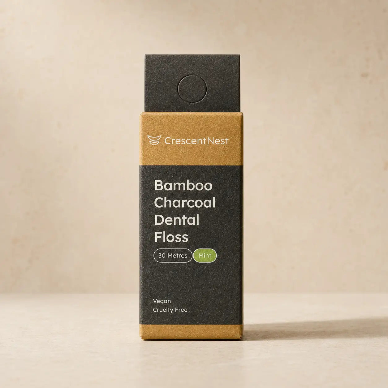 Crescent Nest bamboo charcoal dental floss in retail packaging