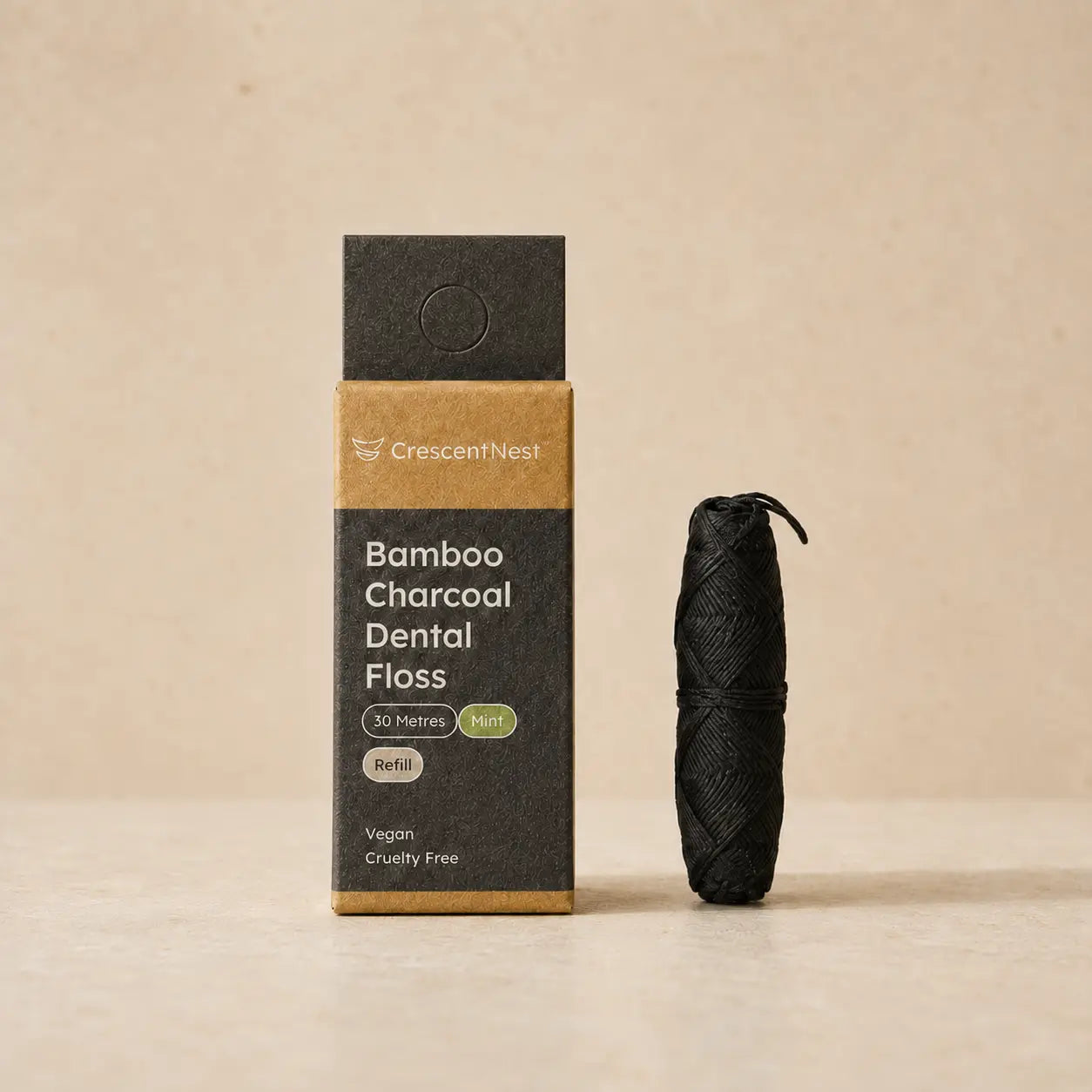 Crescent Nest bamboo charcoal dental floss refill with recyclable packaging