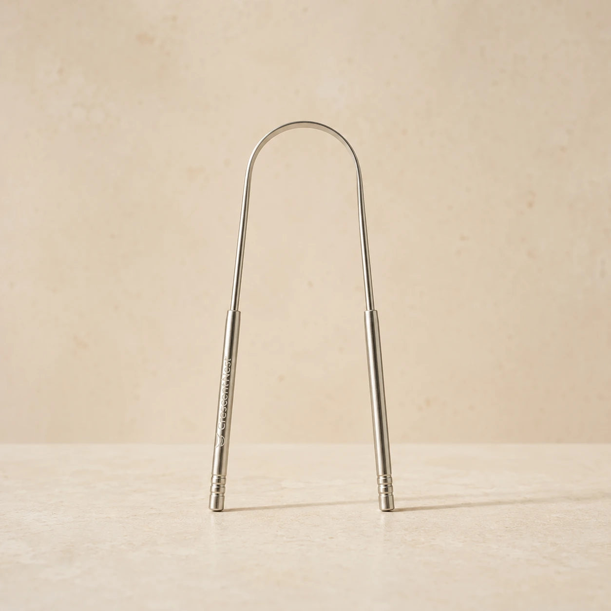 Crescent Nest reusable stainless steel tongue scraper
