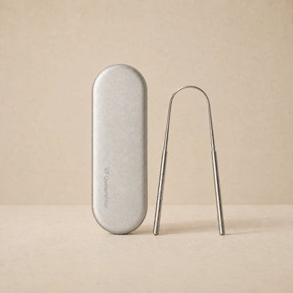 Crescent Nest stainless steel tongue scraper and silver travel case