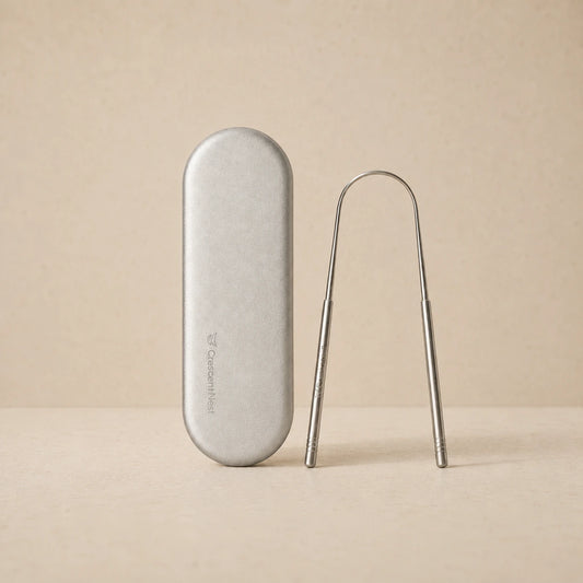 Crescent Nest stainless steel tongue scraper and silver travel case