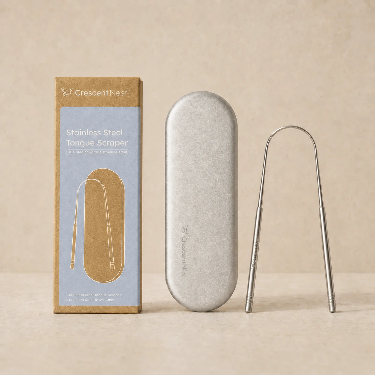Crescent Nest stainless steel tongue scraper with travel case and packaging