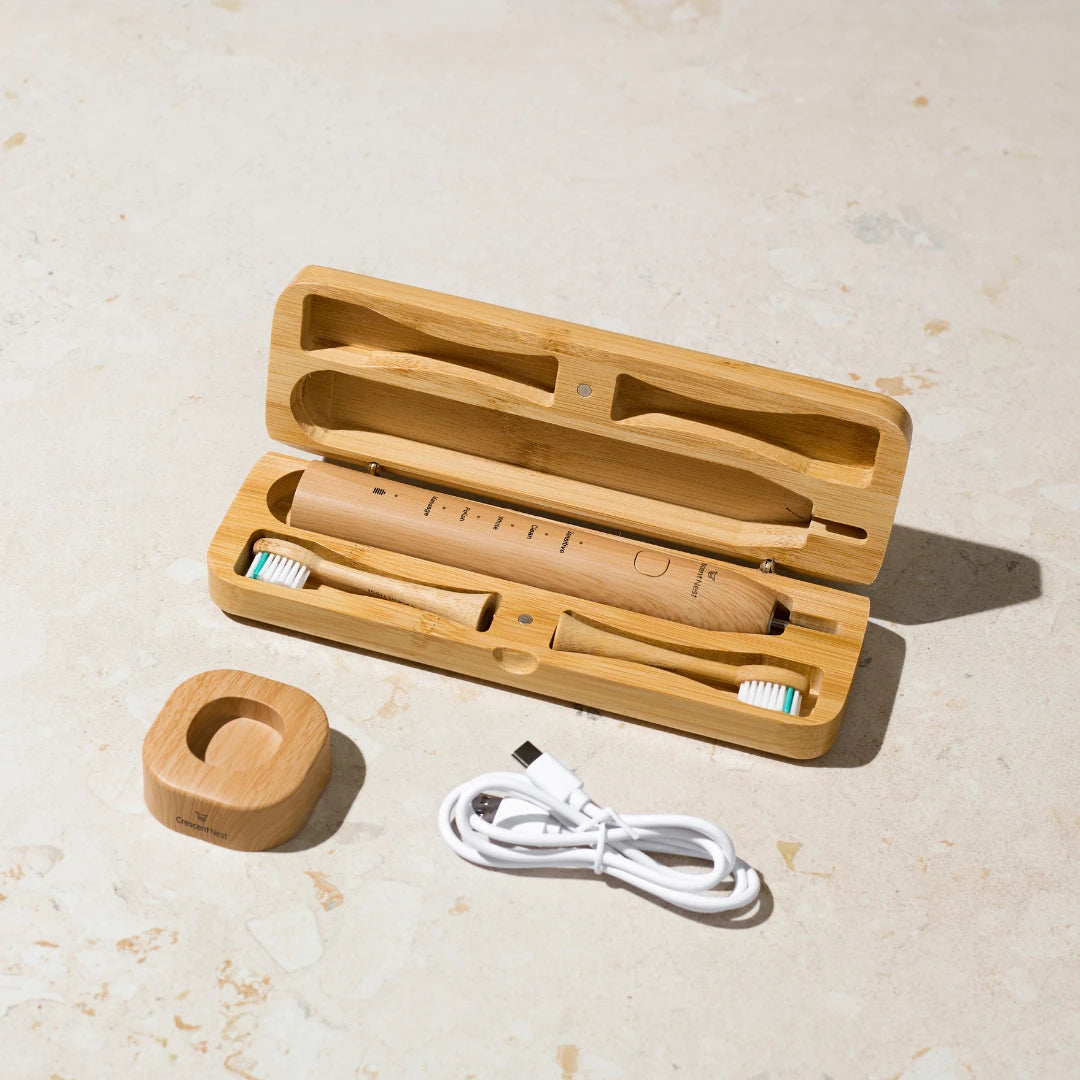 Crescent Nest Travel Set – what’s included: Sustainable Sonic Electric Toothbrush, bamboo travel case, and eco-friendly brush head