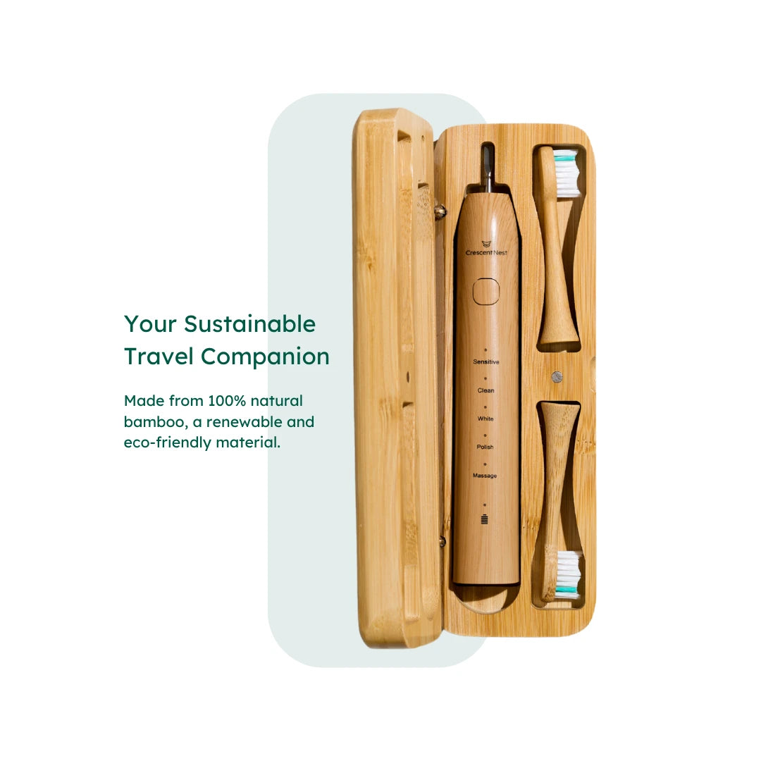 Eco-friendly bamboo toothbrush travel case with sonic toothbrush in a minimalist flatlay.